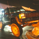 The $600 Jeep XJ flexes on a rock in a nearby strip mall.